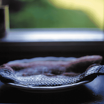 Braiseret pighvar med hokkaido og østershatte.